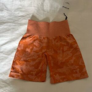 Nvgtn burnt orange camo seamless shorts